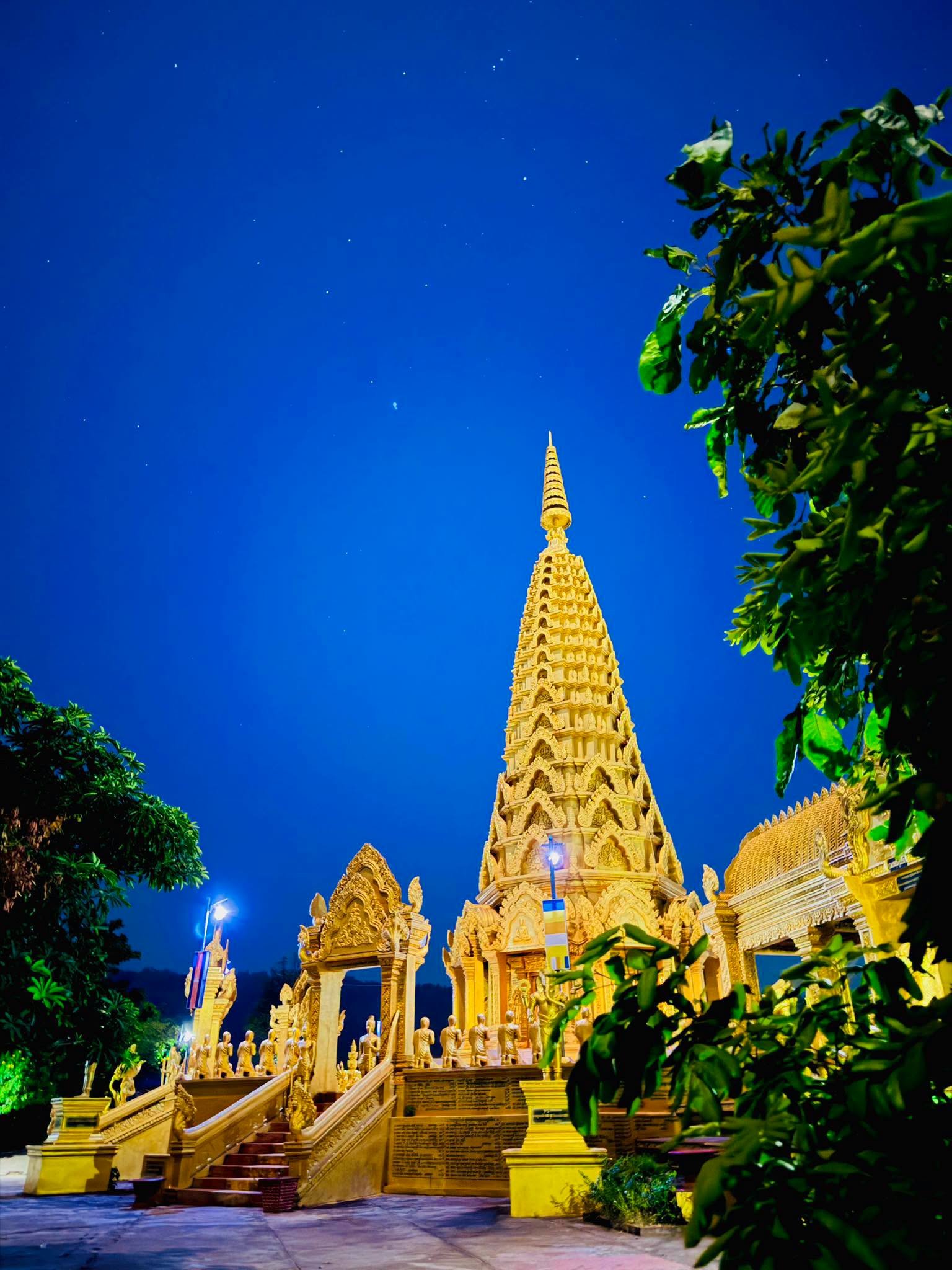 Pailin — illuminated temple at night